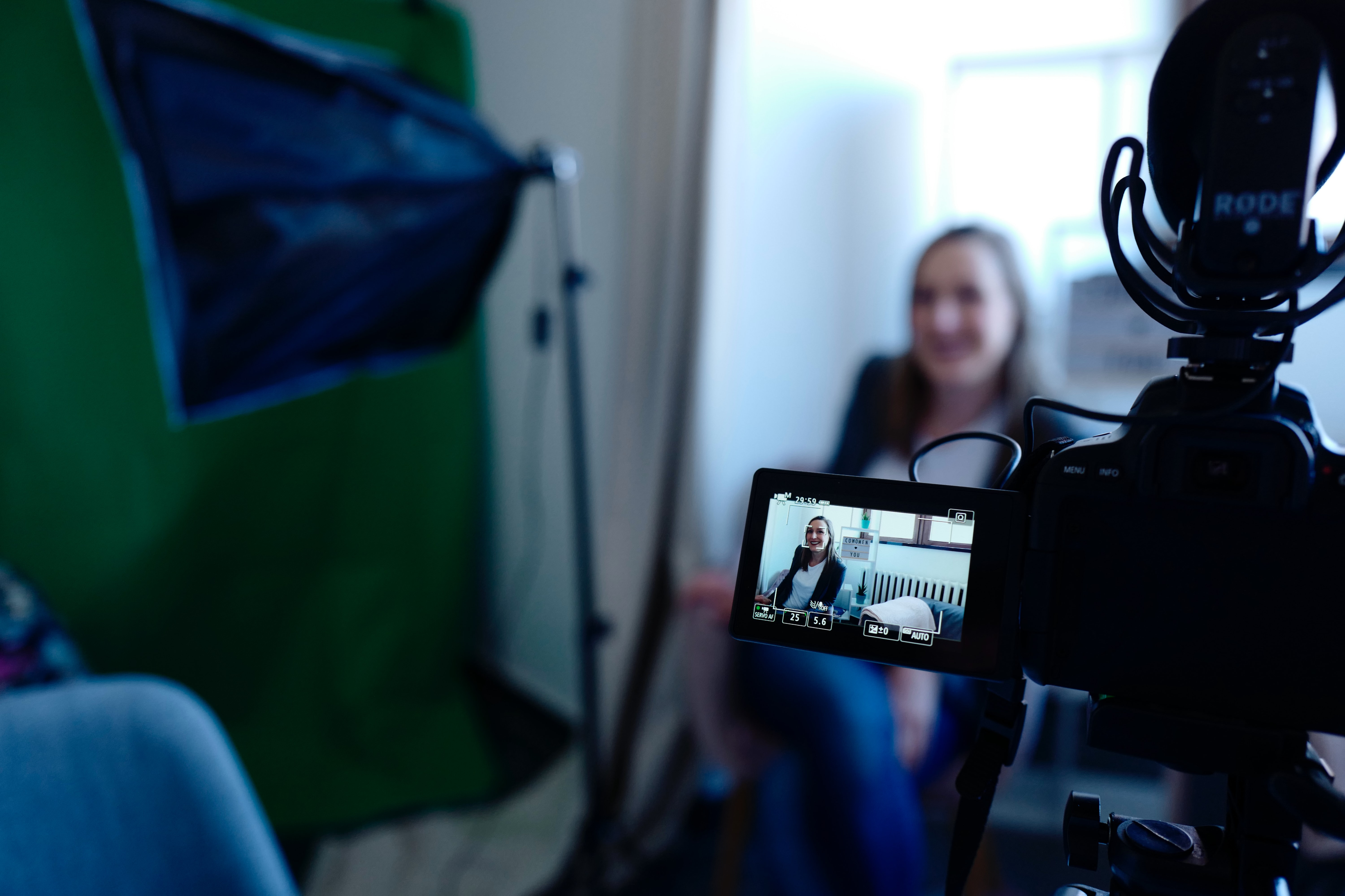 Woman in front of camera Pre-recording a Virtual Meeting Segment | Global agency, BCD Meetings & Events