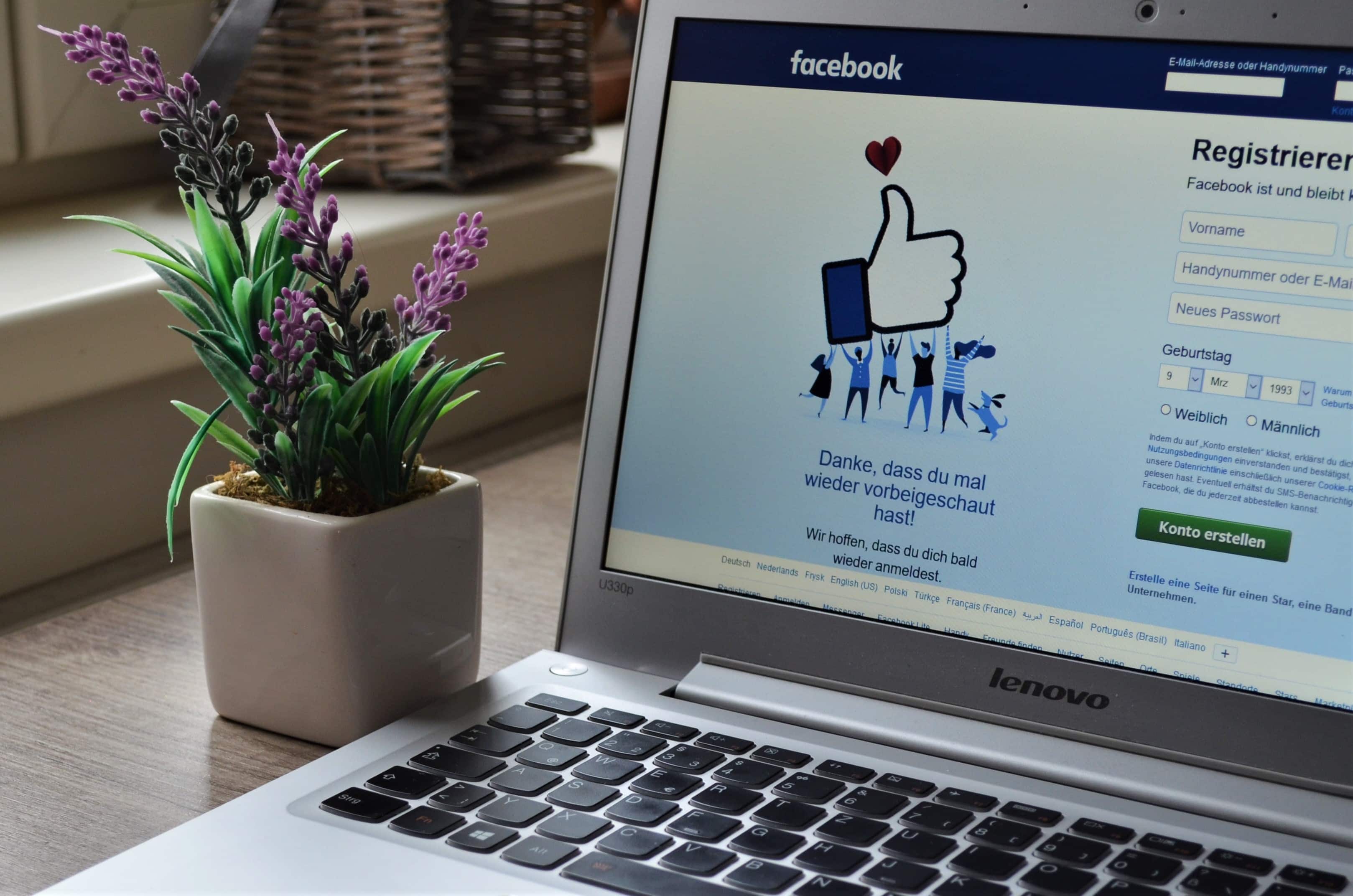 Laptop on desk showing Facebook login page | Global Agency. BCD Meetings & Events