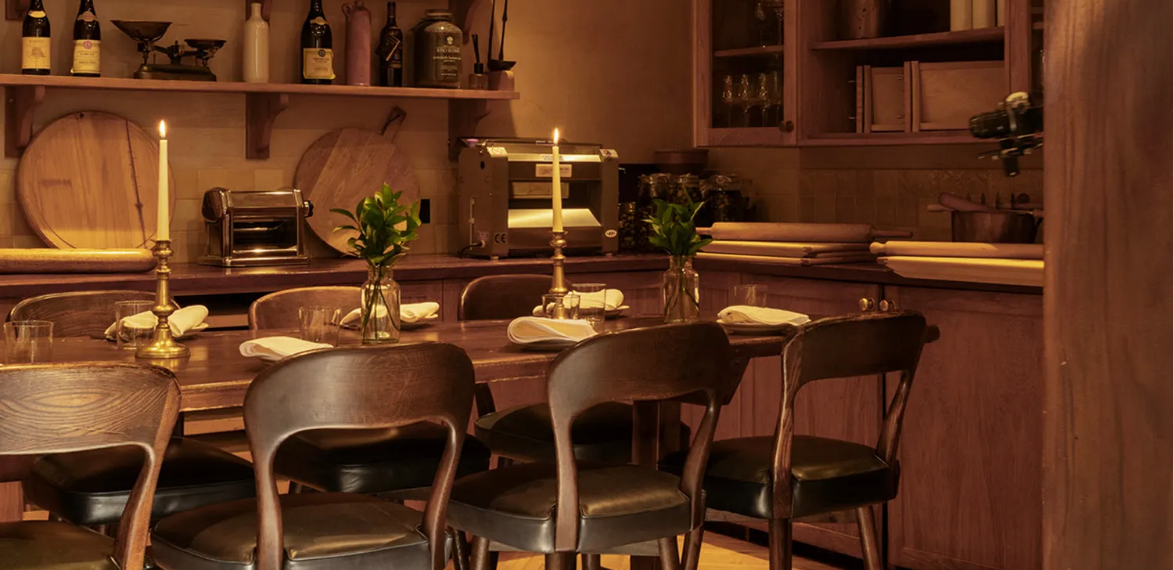 Dining room with pasta machine and low level lighting