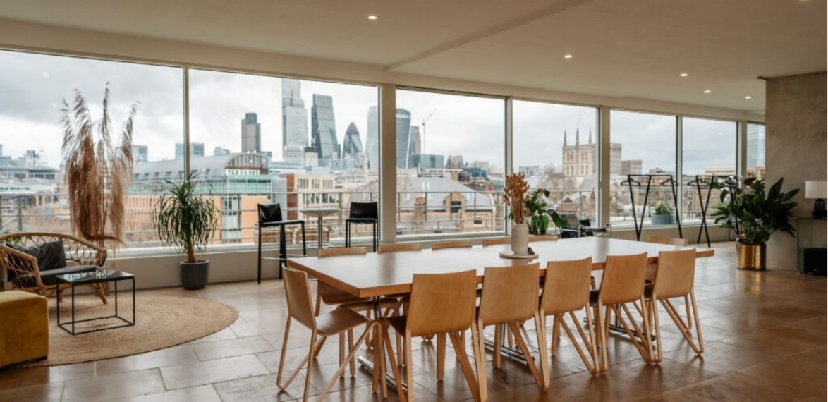wooden table and chairs with views of the city